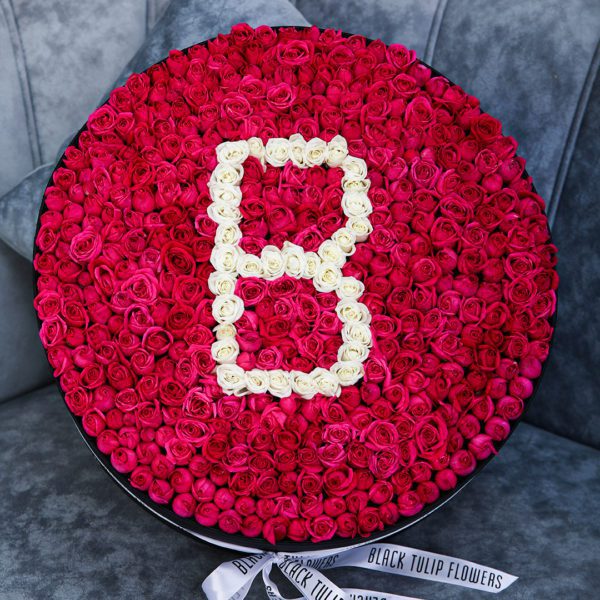 Brilliant Round Arrangement by Black Tulip Flowers