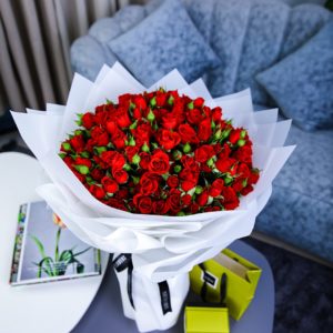 Captivating Red Bouquet with Patchi by Black Tulip Flowers