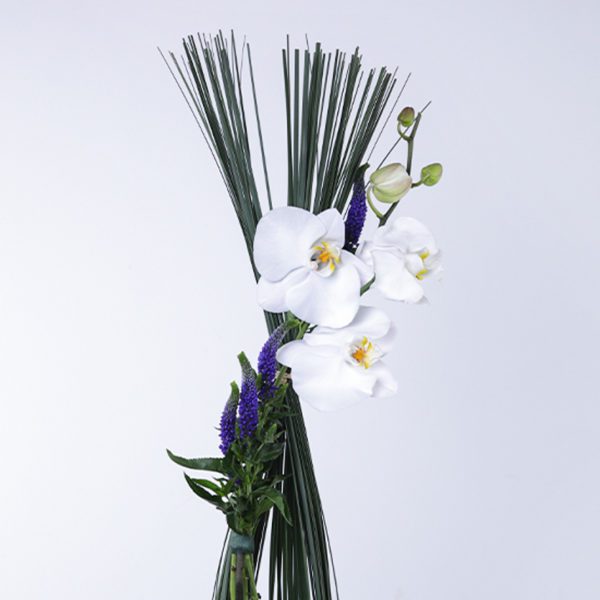 Loyalty Arrangement made with of Phalaenopsis, Veronica and Steel Grass.