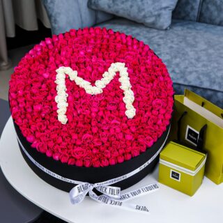 Marvelous Round Arrangement with Patchi Chocolate by Black Tulip Flowers