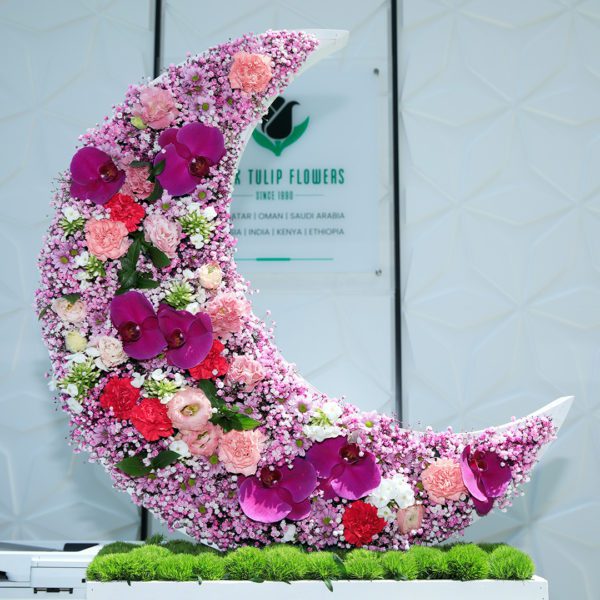Moonlight Special crescent flower arrangement by Black Tulip Flowers