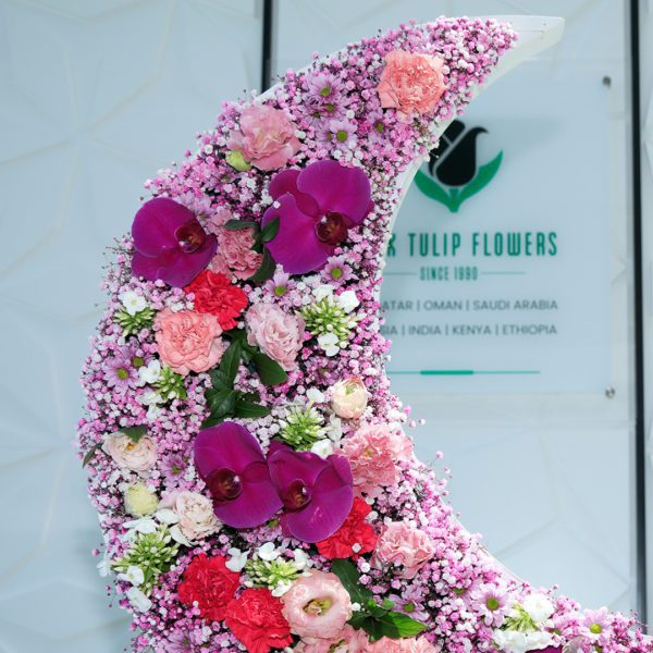 Moonlight Special crescent flower arrangement by Black Tulip Flowers