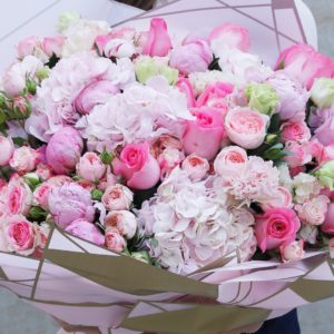 Nurturing Pink Bouquet by Black Tulip Flowers