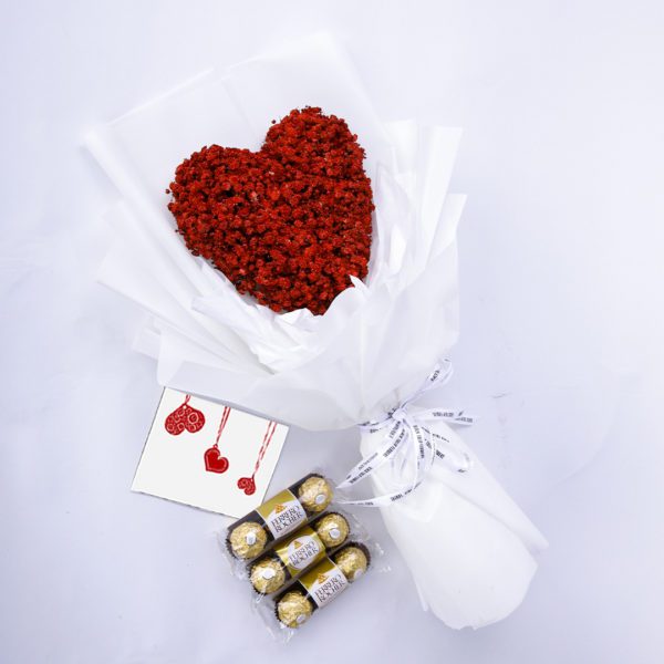 Pure Heart Surprise flower bouquet with ferrero rocher chocolate by Black Tulip Flowers.