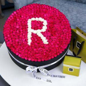 Ravishing Round Arrangement with Patchi Chocolate by Black Tulip Flowers