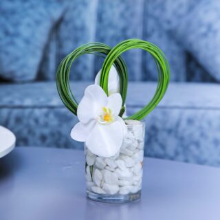 Scenic Centerpiece made with of Phalaenopsis White flower.