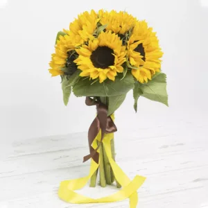 a bouquet of bright yellow sunflowers tied together with a brown ribbon and a yellow ribbon