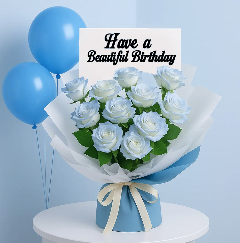 blue-painted-rose-bouquet A beautiful bouquet of light blue roses, wrapped in white and blue paper, on a white table with three blue balloons.