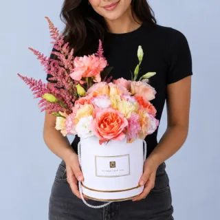 BTF Home 37 Premium peach and pink box arrangement showcasing peach roses, peach lisianthus, bi-color pink lisianthus, and airy pink astilbe stems, arranged with elegant texture and charm.