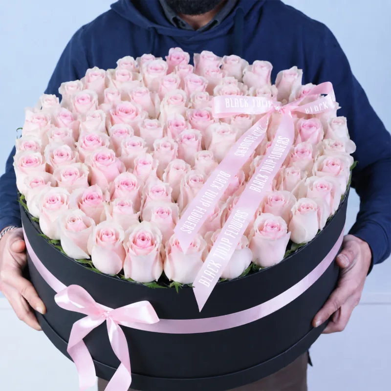 elegant-rose-box Luxury flower box containing fresh roses presented in a neat, structured arrangement with a smooth and elegant visual appeal.