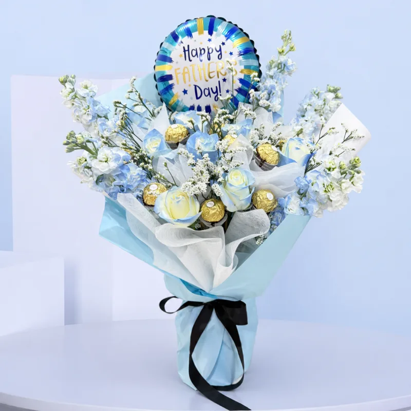 rose-delphinium-chocolate-bouquet-with-balloon Roses and delphinium fresh flower bouquet paired with Ferrero Rocher chocolates and a blue Father's Day balloon, creating a celebratory gift for Dad.