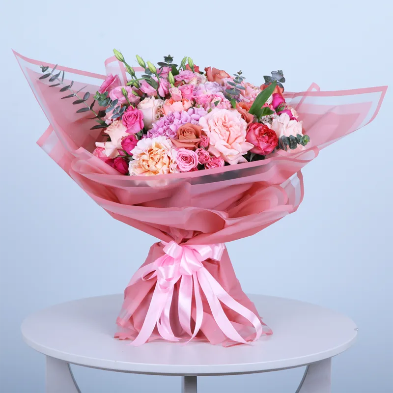 graceful-pink-rose-hydrangea-bouquet Graceful Pink Rose & Hydrangea Bouquet featuring fresh pink roses, pink hydrangeas, pink spray roses, pink lisianthus, and eucalyptus beautifully arranged in an elegant hand bouquet.